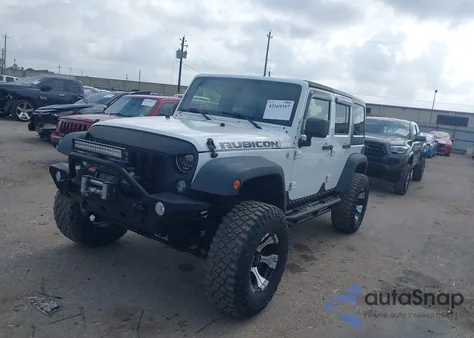 2011 Jeep Wrangler Unlimited Rubicon из США, поврежденный, VIN 1J4BA6H10BL536027